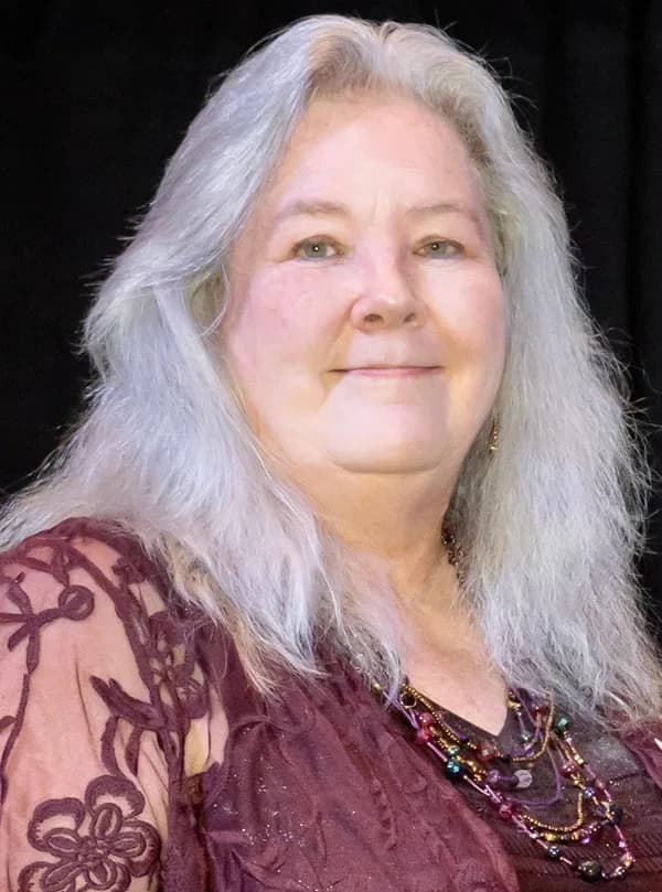 Darla Sommerfield, co-founder of Inspire Center, smiling in a portrait photograph